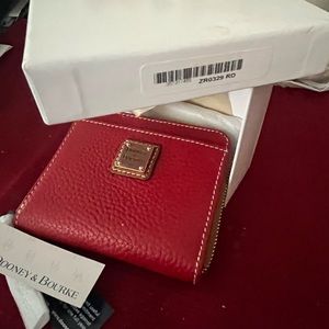 Dooney and Bourke Pebble grain small zip around. Red. NWB.